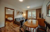 Łóżko lub łóżka w pokoju w obiekcie TheResi Appartements