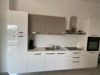 Kuchyňa alebo kuchynka v ubytovaní Apartments Lia-Jolie