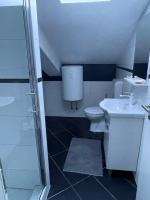 Kúpeľňa v ubytovaní Apartments Lia-Jolie