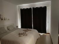 Łóżko lub łóżka w pokoju w obiekcie Casa Marla mit 3 Schlafzimmern und 2 Badezimmern
