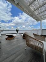 A balcony or terrace at Ultra stylish modern attic