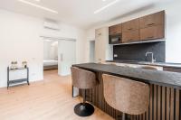 A kitchen or kitchenette at Bilocale Moderno - City Center