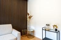 A seating area at Bilocale Moderno - City Center