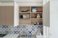A kitchen or kitchenette at DOMUS 73 Apulian holidays
