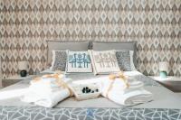 A bed or beds in a room at DOMUS 73 Apulian holidays