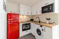 Kuchyň nebo kuchyňský kout v ubytování Apartamento de diseño en el corazón de Santander