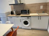 Kuchnia lub aneks kuchenny w obiekcie Cosy T3 proche Gare et Polygone
