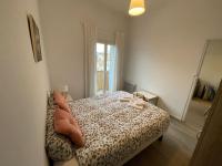 Ein Bett oder Betten in einem Zimmer der Unterkunft Cosy T3 proche Gare et Polygone