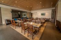 Posezení v ubytování Rakabi The Fern, Igatpuri