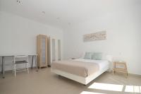 Łóżko lub łóżka w pokoju w obiekcie Villa Carritx 4 pax