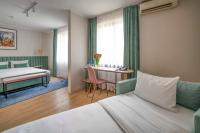 Posteľ alebo postele v izbe v ubytovaní Hotel H12****