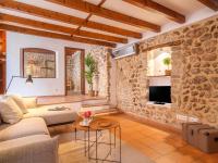 Posezení v ubytování Holiday Home Biniarroi Charm & Quality by Interhome
