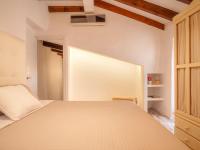 Postel nebo postele na pokoji v ubytování Holiday Home Biniarroi Charm & Quality by Interhome