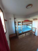 Łóżko lub łóżka w pokoju w obiekcie Chalet 6-8 couchages à la Joue du Loup
