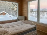 Cama ou camas em um quarto em Holiday Home Villa lehtoniemi by Interhome