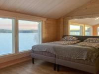 Cama ou camas em um quarto em Holiday Home Villa lehtoniemi by Interhome