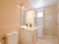 a bathroom with a toilet and a sink and a shower at Apartment Le Grand Large-1 by Interhome in Sainte-Maxime