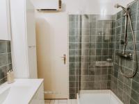a bathroom with a shower and a sink at Studio Zeeduin by Interhome in Bredene