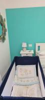 A bed or beds in a room at La Casetta di Meta