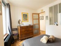 Posteľ alebo postele v izbe v ubytovaní Apartment L'Emeraude by Interhome