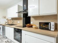 Kuchyňa alebo kuchynka v ubytovaní Apartment L'annexe by Interhome