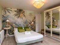 Posteľ alebo postele v izbe v ubytovaní Holiday Home Les Grands Près by Interhome