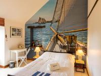 Posteľ alebo postele v izbe v ubytovaní Holiday Home Les Grands Près by Interhome