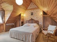 Łóżko lub łóżka w pokoju w obiekcie Holiday Home Ker Vignan by Interhome