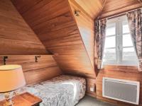 Łóżko lub łóżka w pokoju w obiekcie Holiday Home Ker Vignan by Interhome