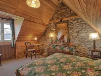 Łóżko lub łóżka w pokoju w obiekcie Holiday Home Ker Vignan by Interhome