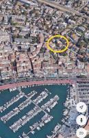 an aerial view of a marina with a yellow circle at STUDIO avec PARKING TOUT A PIED et CALME in Bandol