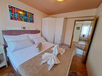 Posteľ alebo postele v izbe v ubytovaní Apartment Bella Sanja