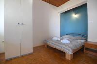 Posteľ alebo postele v izbe v ubytovaní Apartmani Erna
