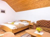 Posteľ alebo postele v izbe v ubytovaní Villa Tatry Stola