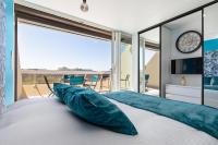 Postel nebo postele na pokoji v ubytování Village Naturiste R4N - Le Bellagio Héliopolis Luxe