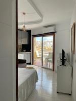 A bed or beds in a room at Calle Manuel Mena 4