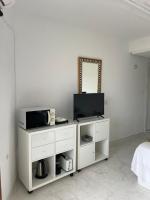 A television and/or entertainment centre at Calle Manuel Mena 4