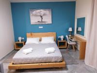 Postel nebo postele na pokoji v ubytování Sea Salt Apartments