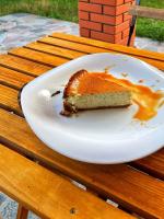 a piece of cake on a plate on a table at Садиба Бабина Лоза in Lisove