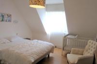 Posteľ alebo postele v izbe v ubytovaní La BERNIQUE Maison familiale Confort & Espace 3 chambres Jardin WIFI