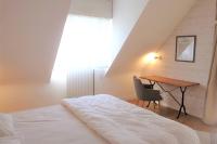 Posteľ alebo postele v izbe v ubytovaní La BERNIQUE Maison familiale Confort & Espace 3 chambres Jardin WIFI