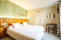 Posteľ alebo postele v izbe v ubytovaní Alameda Hostal Boutique