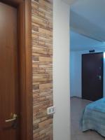 Posteľ alebo postele v izbe v ubytovaní BeaStella Holiday Rooms