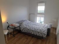 Posteľ alebo postele v izbe v ubytovaní NEW APARTMENT Wołyńska - przestronny, z widokiem, czysto, parking, balkon