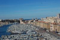 a harbor filled with lots of boats in the water at Sous le Clocher in Marseille