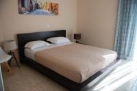 Postel nebo postele na pokoji v ubytování kostas house
