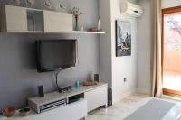 Televízia a/alebo spoločenská miestnosť v ubytovaní Novo Sancti Petri, con piscina todo el año, La Mariposa by Chiclana Dreams