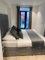 Krevet ili kreveti u jedinici u okviru objekta City centre luxury apartment