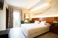 Posteľ alebo postele v izbe v ubytovaní Alameda Hostal Boutique