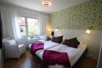 Postel nebo postele na pokoji v ubytování Nynäsgården Hotell & Konferens